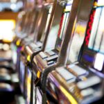 Who influences ticket pricing in online lotteries?